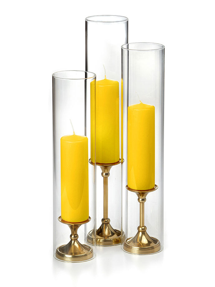 12 Slim Pillar Candles, 12 Glass Chimneys and 12 Gold Timeless Pillar Holders