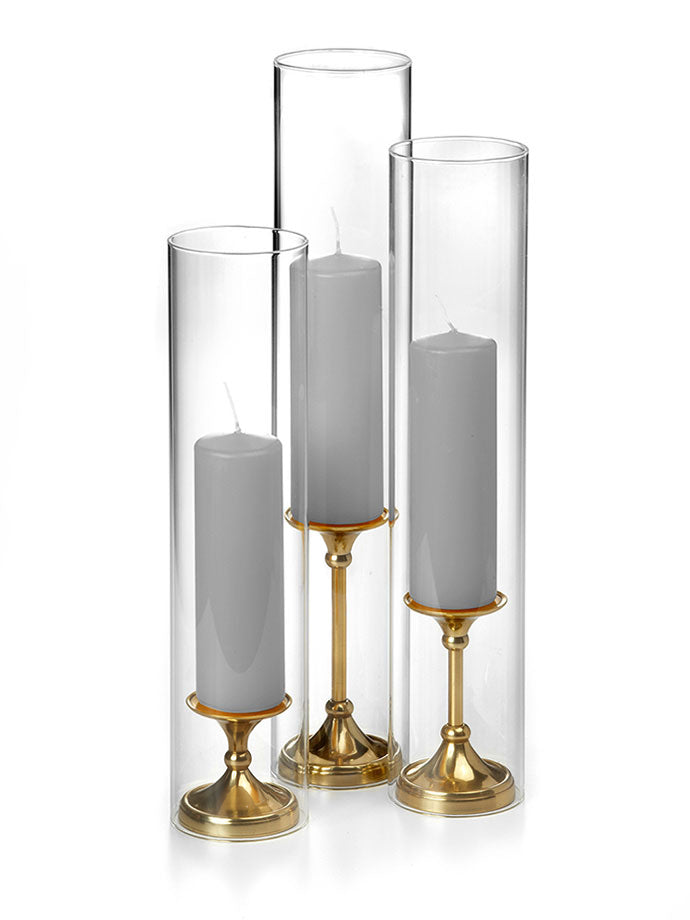 12 Slim Pillar Candles, 12 Glass Chimneys and 12 Gold Timeless Pillar Holders