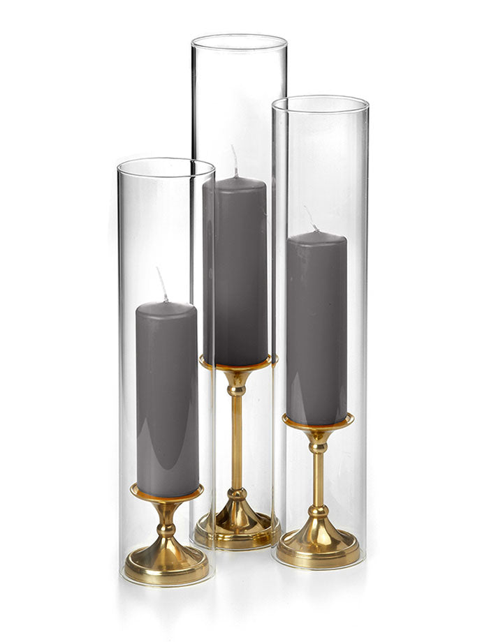 12 Slim Pillar Candles, 12 Glass Chimneys and 12 Gold Timeless Pillar Holders